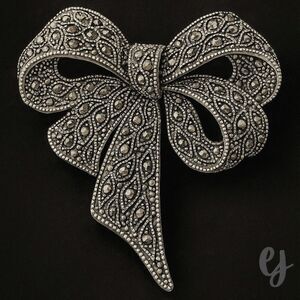 Bro-Brooch - Marcasite Style Bow Lapel Pin in Silver Tone Openwork Setting